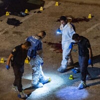 Police inspect the scene of a murder and attempted suicide in the Gilo neighborhood of Jerusalem, on August 11, 2025. (Yonatan Sindel/Flash90)