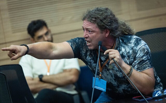 Former soldiers who are suffering from PTSD speak during a Knesset Finance Committee meeting, August 14, 2025. (Yonatan Sindel/Flash90) Former soldiers who are suffering from PTSD speak during a Knesset Finance Committee meeting, August 14, 2025. (Yonatan Sindel/Flash90)