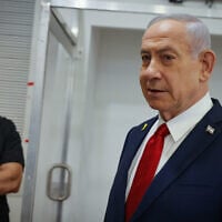 Prime Minister Benjamin Netanyahu arrives to testify at the District Court in Tel Aviv  in his corruption trial on September 16, 2025. (Miriam Alster/Flash90)