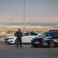 Israeli security forces near the scene where two Israelis were killed in an attack at Allenby Crossing between the West Bank and Jordan, September 18, 2025. (Oren Ben Hakoon/Flash90)