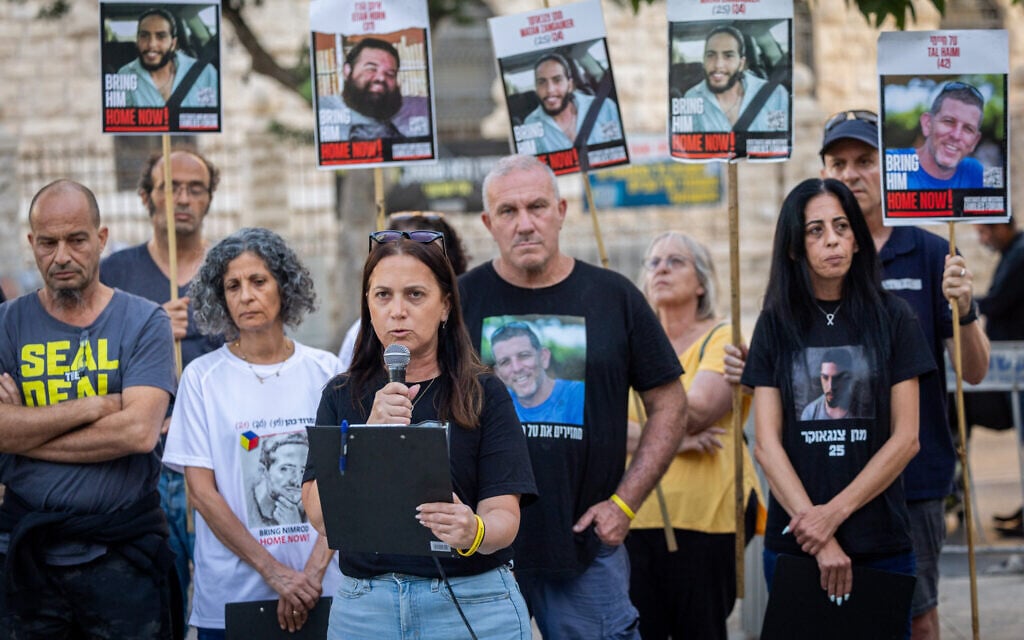 Anat Angrest, the mother hostage soldier Matan Angrest, and other relatives of captives held by Palestinian terrorists in Gaza speak to the press near the Prime Minister's Residence in Jerusalem, September 20, 2025. (Yonatan Sindel/Flash90)