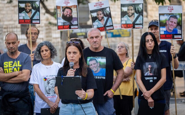 Anat Angrest, the mother hostage soldier Matan Angrest, and other relatives of captives held by Palestinian terrorists in Gaza speak to the press near the Prime Minister's Residence in Jerusalem, September 20, 2025. (Yonatan Sindel/Flash90)