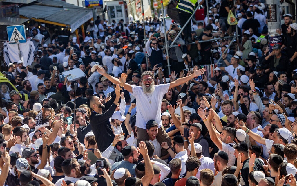 Jewish men near the tomb of Rabbi Nachman of Breslov in Uman, on eve of the Jewish holiday of Rosh Hashanah, September 22, 2025. (Chaim Goldberg/Flash90) Jewish men near the tomb of Rabbi Nachman of Breslov in Uman, on eve of the Jewish holiday of Rosh Hashanah, September 22, 2025. (Chaim Goldberg/Flash90)