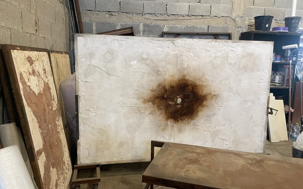 A work by artist Avinadav Begin in his Even Sapir workshop on September 21, 2025 (Jessica Steinberg/Times of Israel)