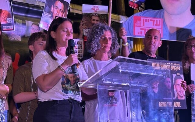 Anat Angrest (left) and Vicky Cohen (right), whose sons are held hostage by Hamas in Gaza, speak at a rally outside the prime minister's residence in Jerusalem on September 3, 2025. (Charlie Summers/Times of Israel)