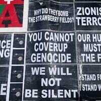 Protest signs accuse Israel of genocide, at the United Nations Headquarters in New York City, August 28, 2025. (Luke Tress/Times of Israel)