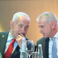 Prime Minister Benjamin Netanyahu, left, and Mossad Director David Barnea at the Prime Minister's Award ceremony in Jerusalem, September 17, 2025. (Amos Ben Gershom/GPO)