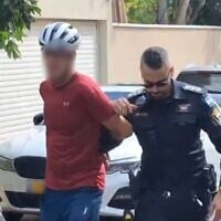 Police arrest a man at a hostage protest outside Education Minister Yoav Kisch's home in hod Hasharon, September 6, 2025. (Screenshot/X)