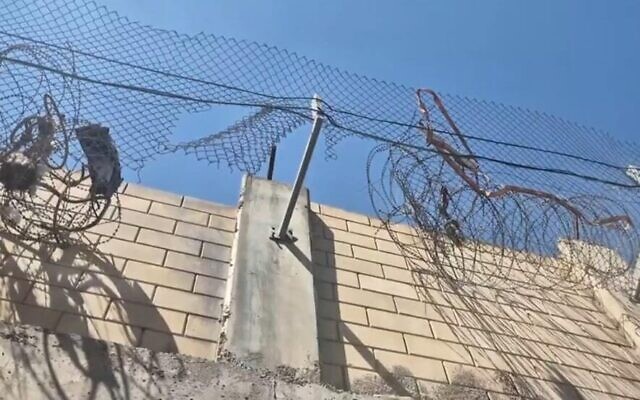 A breach in the West Bank security barrier used by two Palestinian terrorists to cross into Jerusalem, where they carried out a deadly shooting attack at Ramot Junction on September 8, 2025. (Screenshot/Ynet) A breach in the West Bank security barrier used by two Palestinian terrorists to cross into Jerusalem, where they carried out a deadly shooting attack at Ramot Junction on September 8, 2025. (Screenshot/Ynet)