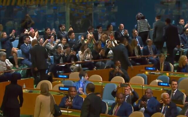 Delegates walk out of the UN General Assembly hall as Prime Minister Benjamin Netanyahu prepares to address the hall, September 26, 2025 (UN Screenshot)
