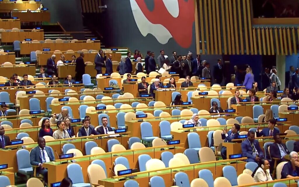 Delegates walk out of the UN General Assembly hall as Prime Minister Benjamin Netanyahu prepares to address the hall, September 26, 2025 (UN Screenshot)