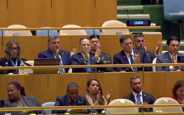 Members of Israel's delegation applaud as Prime Minister Benjamin Netanyahu speaks during the General Debate of the United Nations General Assembly at UN headquarters in New York City on September 26, 2025. (UN screenshot)