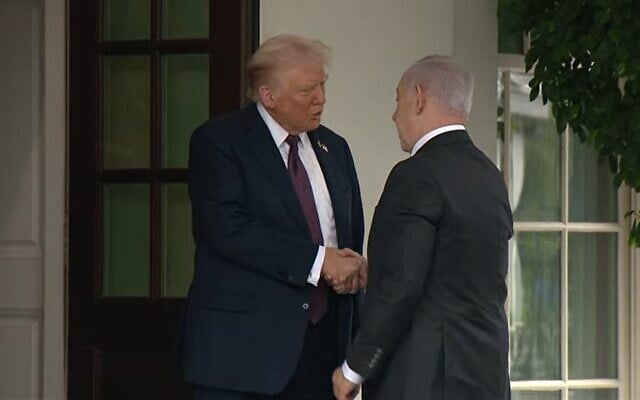 Prime Minister Benjamin Netanyahu (right) shakes hands with US President Donald Trump, at the White House, in Washington, DC, September 29, 2025. (YouTube screenshot)
