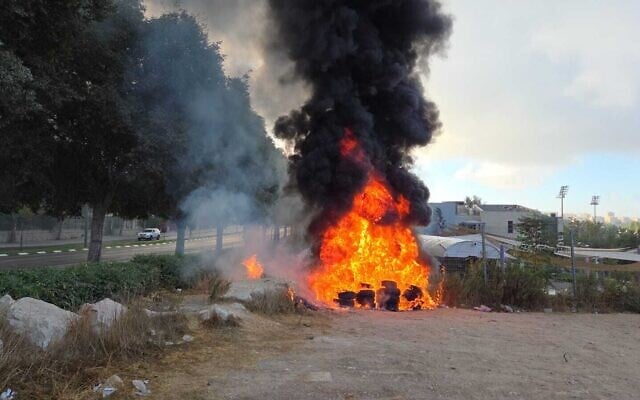 Tires set on fire near the Prime Minister's Office in Jerusalem as part of a demonstration for a hostage-ceasefire deal on September 3, 2025. (Israel Police) Tires set on fire near the Prime Minister's Office in Jerusalem as part of a demonstration for a hostage-ceasefire deal on September 3, 2025. (Israel Police)