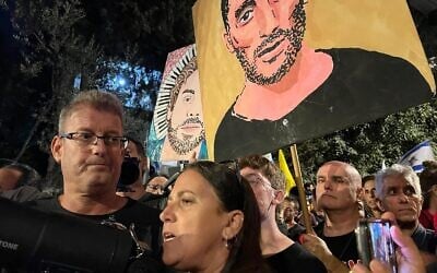 Anat and Haggai Angrest, parents of hostage Matan Angrest, protesting outside the residence of Prime Minister Benjamin Netanyahu on Azza Street in Jerusalem on September 6, 2025 (Credit Yael Gadot/Israeli Pro-Democracy Protest Movement)