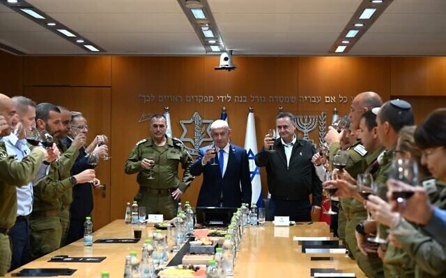 From L-R: IDF Chief of Staff Eyal Zamir, Prime Minister Benjamin Netanyahu, and Defense Minister Israel Katz attend a Rosh Hashanah toast, in Tel Aviv, September 22, 2025. (GPO/Haim Zach)