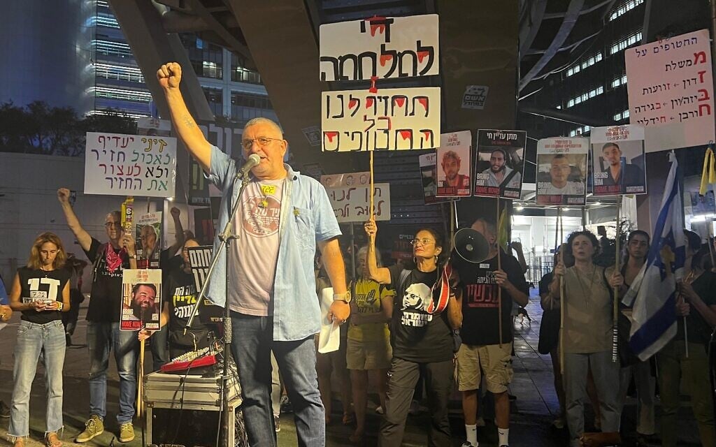 Danny Elgarat, brother of slain hostage Itzik Elgarat, speaks at a protest to end the war and bring back the hostages in Tel Aviv on September 27, 2025. (Yael Gadot/Pro-Democracy Protest Movement)