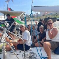 A group of people on board the boat “Karma,” which is escorting the Global Sumud Flotilla, as it sails towards Gaza in September 2025. (Courtesy Arturo Scotto)