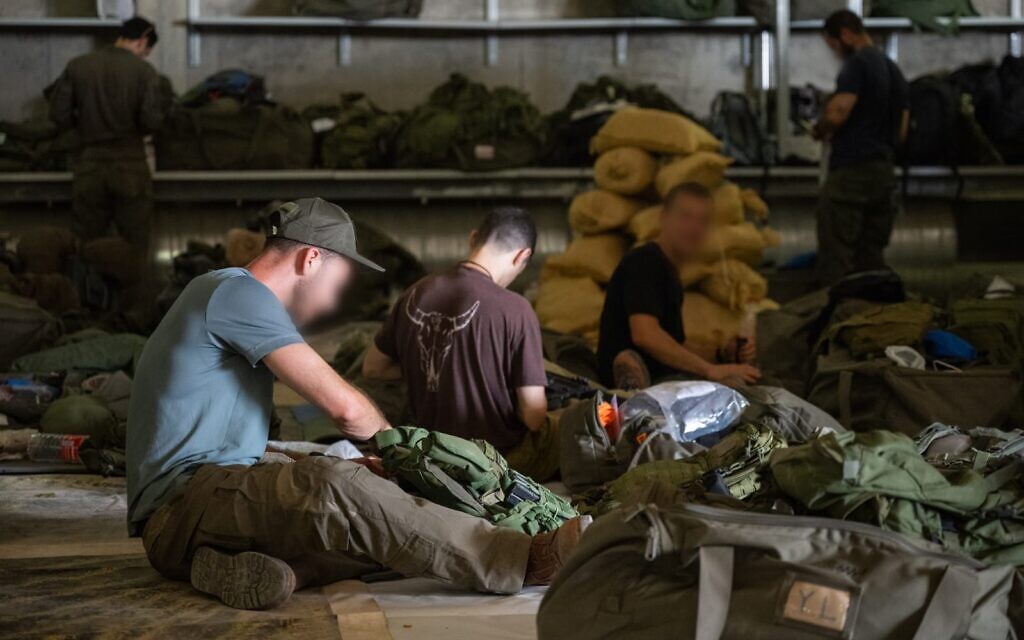 Soldiers ready their gear amid massive IDF reservist callup on September 2, 2025. (Israel Defense Forces)