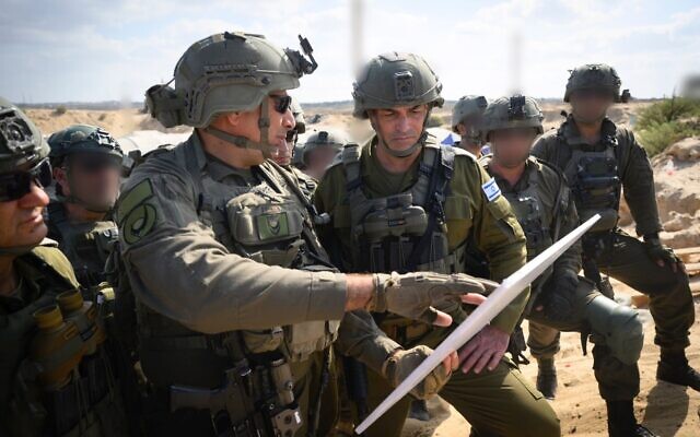 IDF Chief of Staff Lt. Gen. Eyal Zamir (right) speaks with  98th Division commander Brig. Gen. Guy Levi and other officers in Gaza City, September 16, 2025. (Israel Defense Forces)