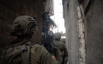 IDF soldiers seen operating in Gaza City in a picture released for publication on September 24, 2025 (Israel Defense Forces)