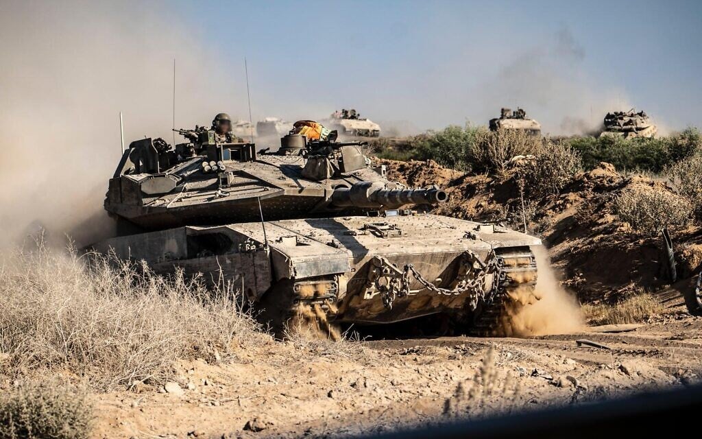 An IDF tank moves towards Gaza City at the start of an IDF operation to capture the city in a picture released on September 16, 2025 (Israel Defense Forces)
