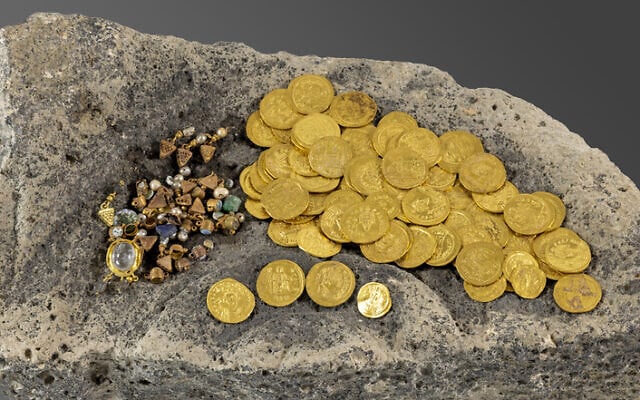 A hoard of 97 pure gold coins dating back to the 6th and 7th centuries CE, unearthed during archaeological excavations in the ancient city of Hippos (Sussita), near the Sea of Galilee, in a discovery announced on September 25, 2025. (Dr. Michael Eisenberg/University of Haifa)