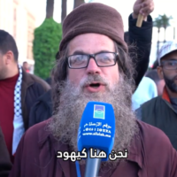 Dual American-Israeli citizen Yaakov Perl, an alleged spy for Iran who was arrested by authorities on September 4, 2025, speaks at an anti-Israel protest in Rabat, Morocco on November 9, 2023. (Screenshot/Youtube)