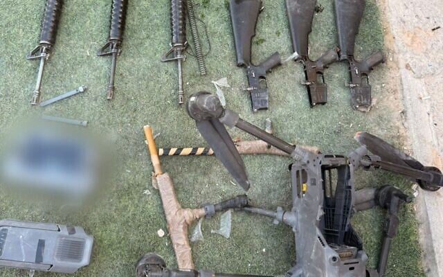 Weapons and a drone that were seized by IDF troops following an attempted smuggling on the Egyptian border, September 28, 2025. (Israel Defense Forces)