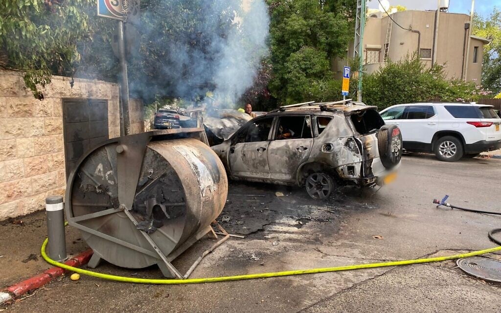 Car burns near PM’s residence as protesters torch dumpsters, drawing politicians’ ire