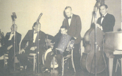 A young Jeffrey Epstein plays the accordion at a bar mitzvah celebration, accompanied by a live band. A handwritten note at the bottom, not visible, reads 'Aaron Brown Bar Mitzvah, Wynn Hotel, Philly, Sept. 23, 1961.' (From Epstein birthday book via JTA)