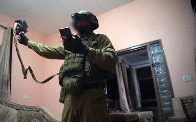 IDF surveyors take measurements at the homes of the two Palestinian terrorists who carried out a deadly shooting attack in Jerusalem on September 8, 2025 to prepare their potential demolition (IDF Spokesperson)