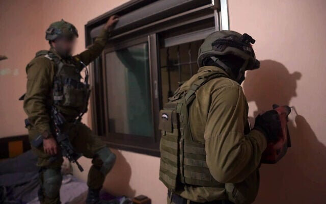 IDF surveyors at the homes of the two Palestinian terrorists who carried out a deadly shooting attack in Jerusalem on September 8, 2025, prepare their potential demolition (IDF Spokesperson) IDF surveyors at the homes of the two Palestinian terrorists who carried out a deadly shooting attack in Jerusalem on September 8, 2025, prepare their potential demolition (IDF Spokesperson)