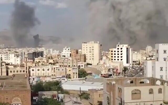 Footage posted to social media on September 25, 2025, purports to show smoke rising in Sanaa, Yemen, following Israeli airstrikes. (Screenshot: X; used in accordance with Clause 27a of the Copyright Law)