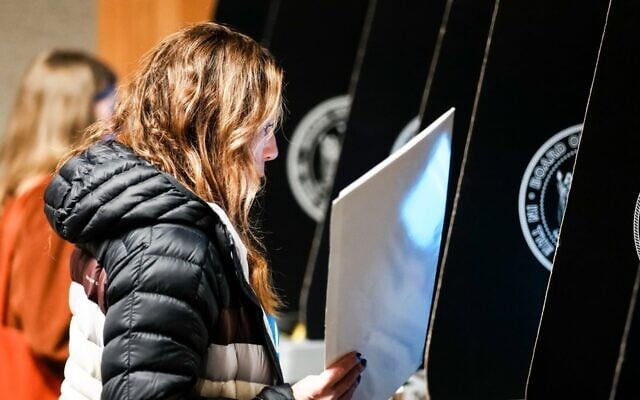 Jewish women casting their votes in the New York City mayoral election face a choice between their priorities as Jews and as women. (ZAMEK/VIEWpress via Getty Images via JTA)