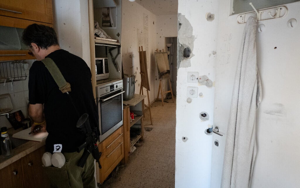 The entrance to the home of Sivan Elkabets and Naor Hasidim, in Kfar Aza, October 7, 2025. (Luke Tress/Times of Israel)