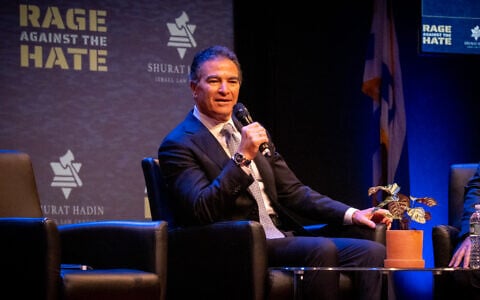 Former Mossad chief Yossi Cohen speaks at a Shurat HaDin conference in New York City, October 27, 2025. (Luke Tress/Times of Israel)
