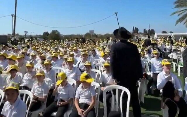 Young Haredi yeshiva students rally against arrests of draft evaders outside the Beit Lid military prison on October 27, 2025, as part of the ultra-Orthodox campaign against IDF conscription. They wear yellow hats, and some hold yellow balloons, echoing symbols of the hostage families' struggle. (X screenshot, used in accordance with clause 27a of the copyright law) Young Haredi yeshiva students rally against arrests of draft evaders outside the Beit Lid military prison on October 27, 2025, as part of the ultra-Orthodox campaign against IDF conscription. They wear yellow hats, and some hold yellow balloons, echoing symbols of the hostage families' struggle. (X screenshot, used in accordance with clause 27a of the copyright law)