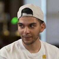 Former hostage Yosef-Haim Ohana speaks in an interview with Channel 12 broadcast on October 28, 2025 (Screncapture)