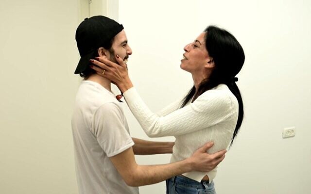 Einav Zangauker is reunited with her son, freed hostage Matan (L) , after he was held in Gaza for over two years, in Re'im on October 13, 2025. (Israel Defense Forces)