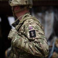 Illustrative: A British soldier of the United Nations Multidimensional Integrated Stabilization Mission in Mali (MINUSMA), makes a round on a watchtower in Menaka, Mali, on October 22, 2021. (Florent Vergnes/AFP)