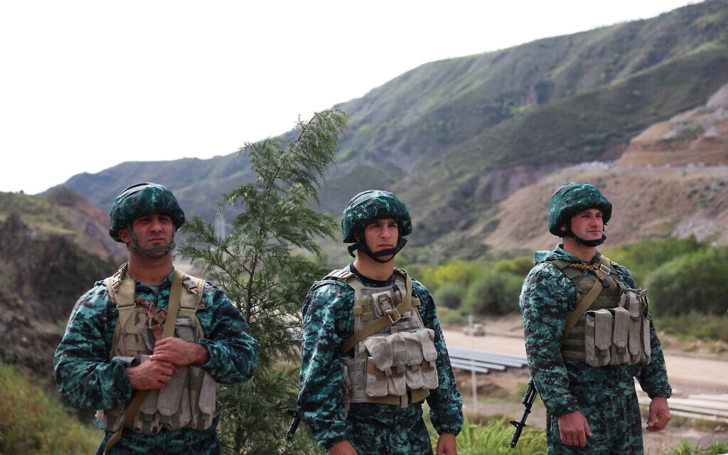 Azerbaijan soldiers stand guard at the Lachin checkpoint, on September 26, 2023. (Emmanuel Dunand / AFP)