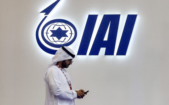 A man walks near the Israel Aerospace Industries (IAI) pavilion during the 2023 Dubai Airshow at Al-Maktoum International Airport in Dubai, on November 14, 2023. (Karim SAHIB / AFP)