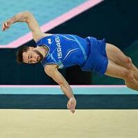 Israel's Artem Dolgopyat competes in the artistic gymnastics men's floor exercise final during the 2024 Olympic Games in Paris, on August 3, 2024. (Loic VENANCE / AFP)
