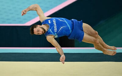 Israel's Artem Dolgopyat competes in the artistic gymnastics men's floor exercise final during the 2024 Olympic Games in Paris, on August 3, 2024. (Loic VENANCE / AFP)