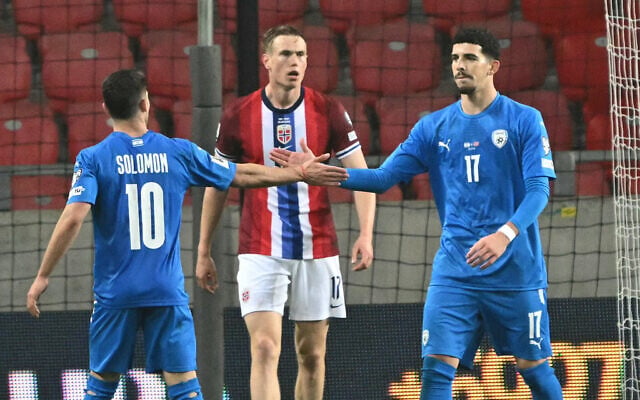 Israel's Dor David Turgeman (R) celebrates with Manor Solomon scoring during the 2026 World Cup Group I qualifier football match between Israel and Norway, in Debrecen, Hungary, on March 25, 2025. (Attila KISBENEDEK / AFP) Israel's Dor David Turgeman (R) celebrates with Manor Solomon scoring during the 2026 World Cup Group I qualifier football match between Israel and Norway, in Debrecen, Hungary, on March 25, 2025. (Attila KISBENEDEK / AFP)