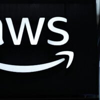 The logo of Amazon Web Services (AWS) is seen during the opening of the Hannover Messe industrial trade fair for mechanical and electrical engineering and digital industries, on March 31, 2025 in Hanover, northern Germany.  (Photo by RONNY HARTMANN / AFP)
