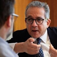 Khaled El-Enany, Egyptologist and former Minister of Tourism and Antiquities of Egypt, and candidate to become head of the United Nations Educational, Scientific and Cultural Organization (UNESCO) speaks during an interview with AFP at a hotel in Paris on April 10, 2025. (Xavier GALIANA / AFP)