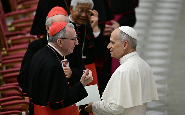 Pope Leo XIV (R) talks with Cardinal Secretary of State Pietro Parolin at the end of the meditation by Sr. Maria Gloria Riva of the Perpetual Adorers of the Blessed Sacrament, part of the Jubilee of the Holy See at the Aula Paolo VI (Paul VI Audience Hall), in The Vatican, on June 9, 2025. (Tiziana FABI / AFP) Pope Leo XIV (R) talks with Cardinal Secretary of State Pietro Parolin at the end of the meditation by Sr. Maria Gloria Riva of the Perpetual Adorers of the Blessed Sacrament, part of the Jubilee of the Holy See at the Aula Paolo VI (Paul VI Audience Hall), in The Vatican, on June 9, 2025. (Tiziana FABI / AFP)