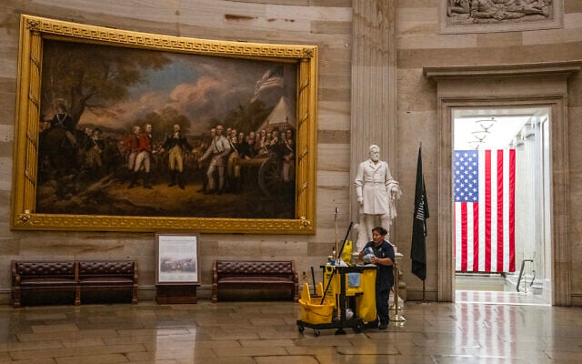 A member of the cleaning staff makes her way through the Rotunda on an empty US Capitol in Washington, DC, on September 30, 2025. (ANDREW CABALLERO-REYNOLDS / AFP) A member of the cleaning staff makes her way through the Rotunda on an empty US Capitol in Washington, DC, on September 30, 2025. (ANDREW CABALLERO-REYNOLDS / AFP)